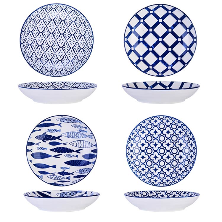 white and blue decal porcelain plates