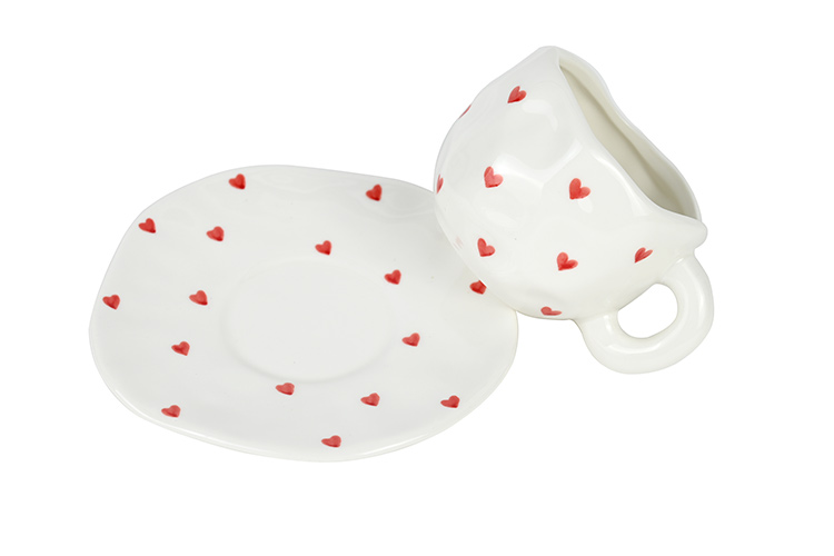 ceramic coffee cup saucer set with red hearts