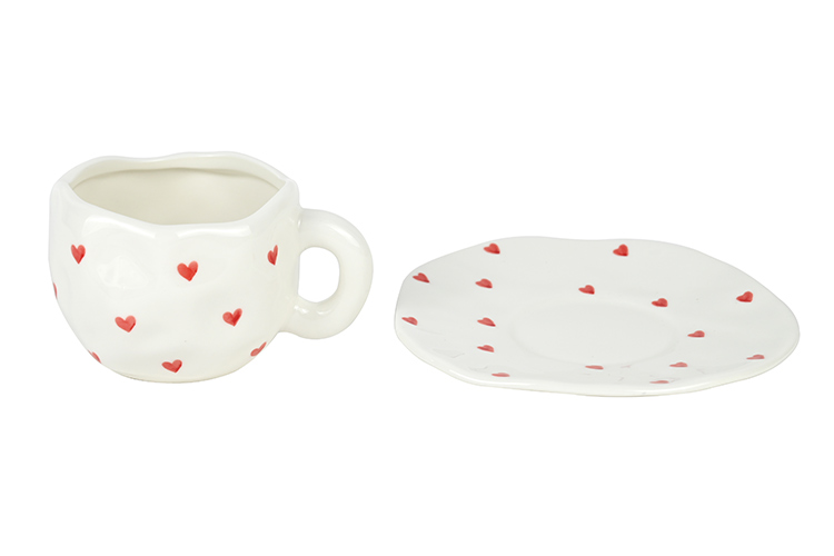 ceramic cup with saucer with red hearts