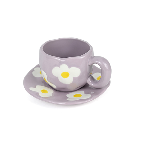 purple color ceramic mug and saucer