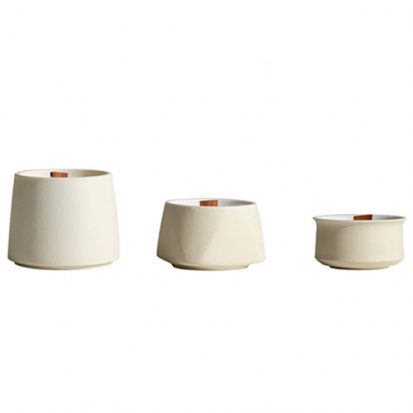 cream color ceramic candle jars